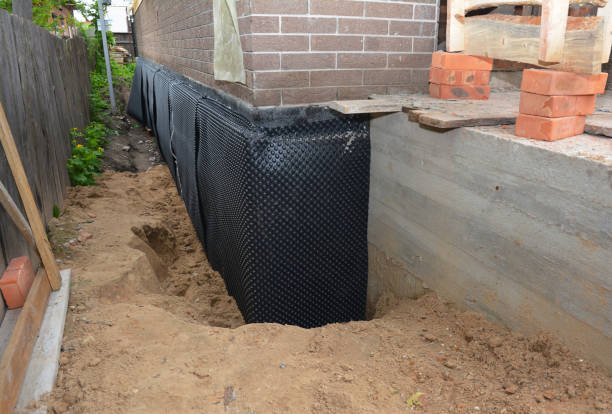SJ Waterproofing Pros technician performing targeted Emergency Waterproofing assessment in Red Hill, PA